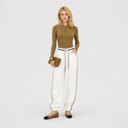 Women's white relaxed trousers front view