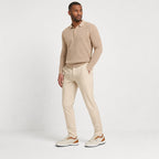 Beige men's contrast trainers styled on model