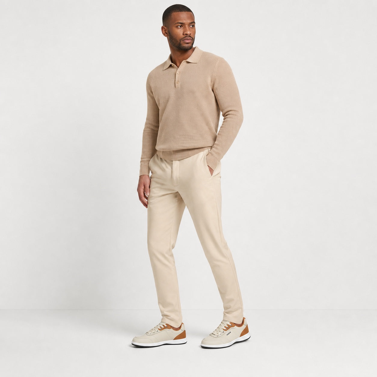 Beige men's contrast trainers styled on model