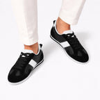 Black men's retro panel trainers detail view