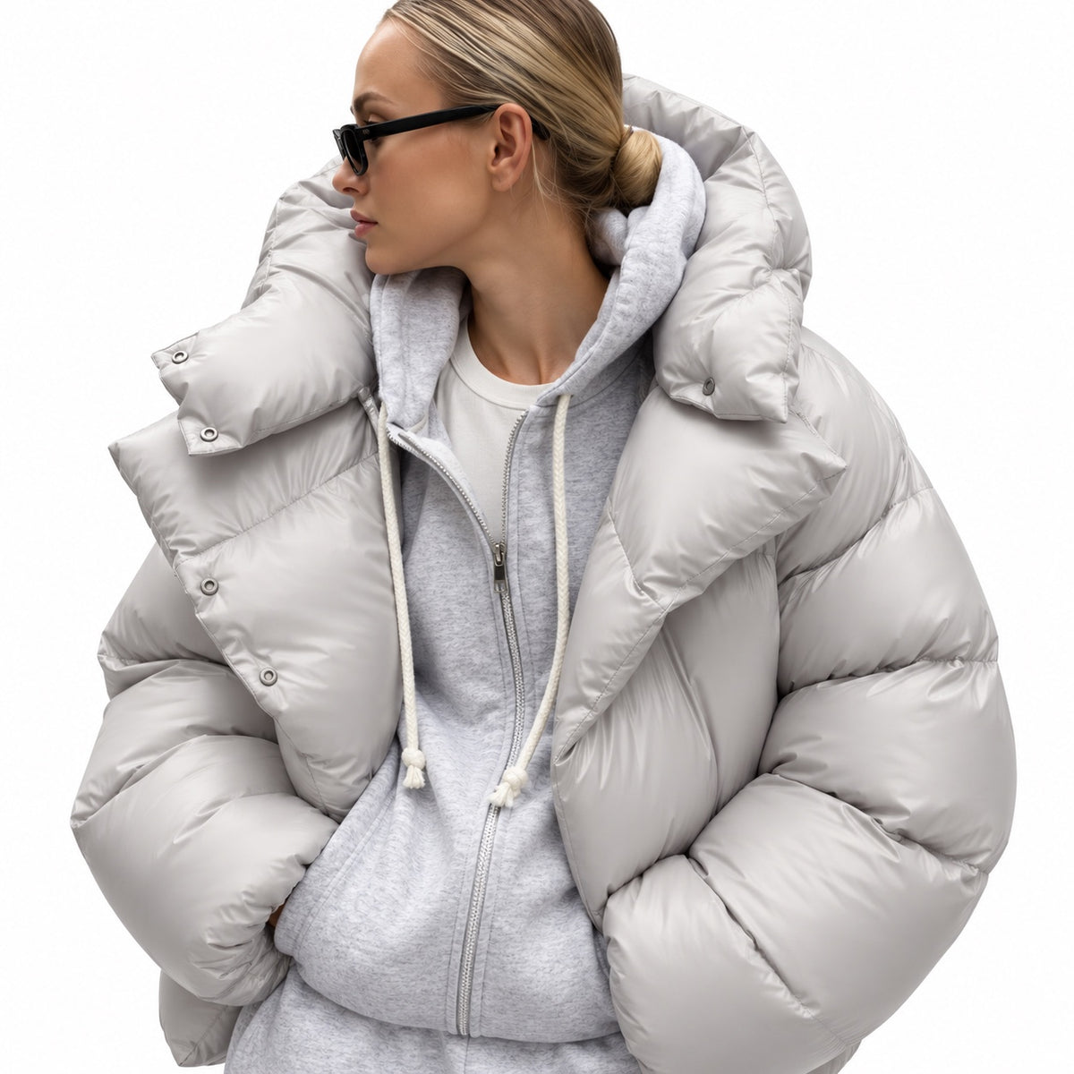 Women's glossy puffer jacket in Light Grey - detail view
