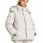 Women's hooded puffer jacket in Beige - detail view