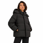 Women's hooded puffer jacket in Black - front view