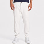 Men's white pinstripe pleated trousers front view